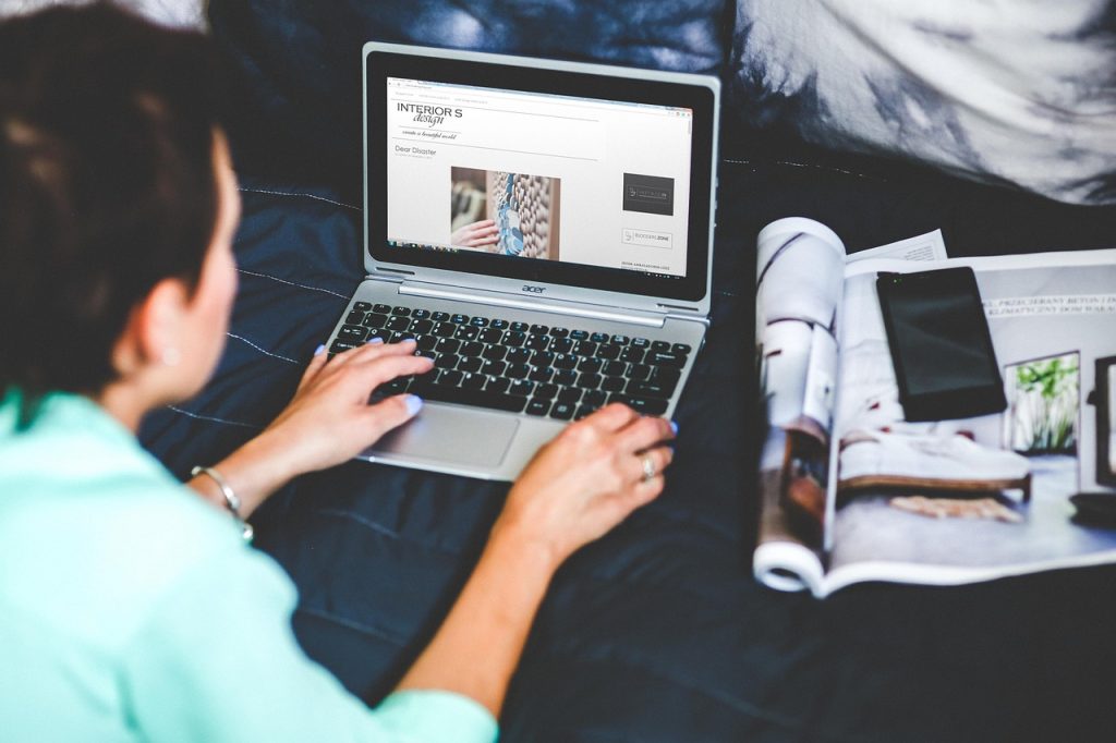 Man earning online income with remote work on his computer