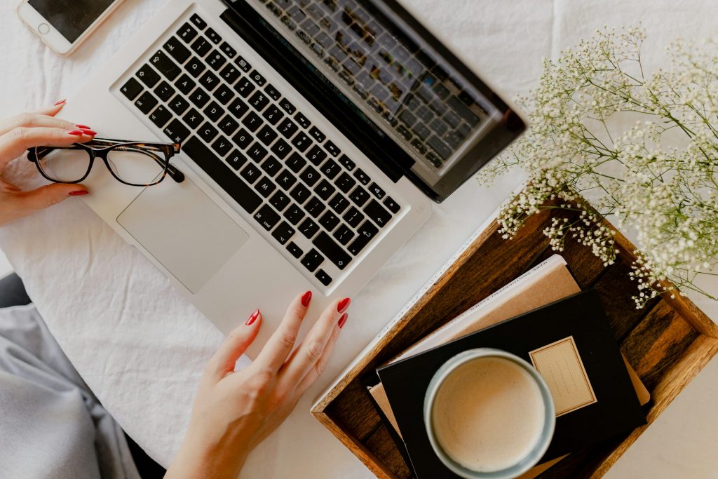 Woman freelance typing on her laptop