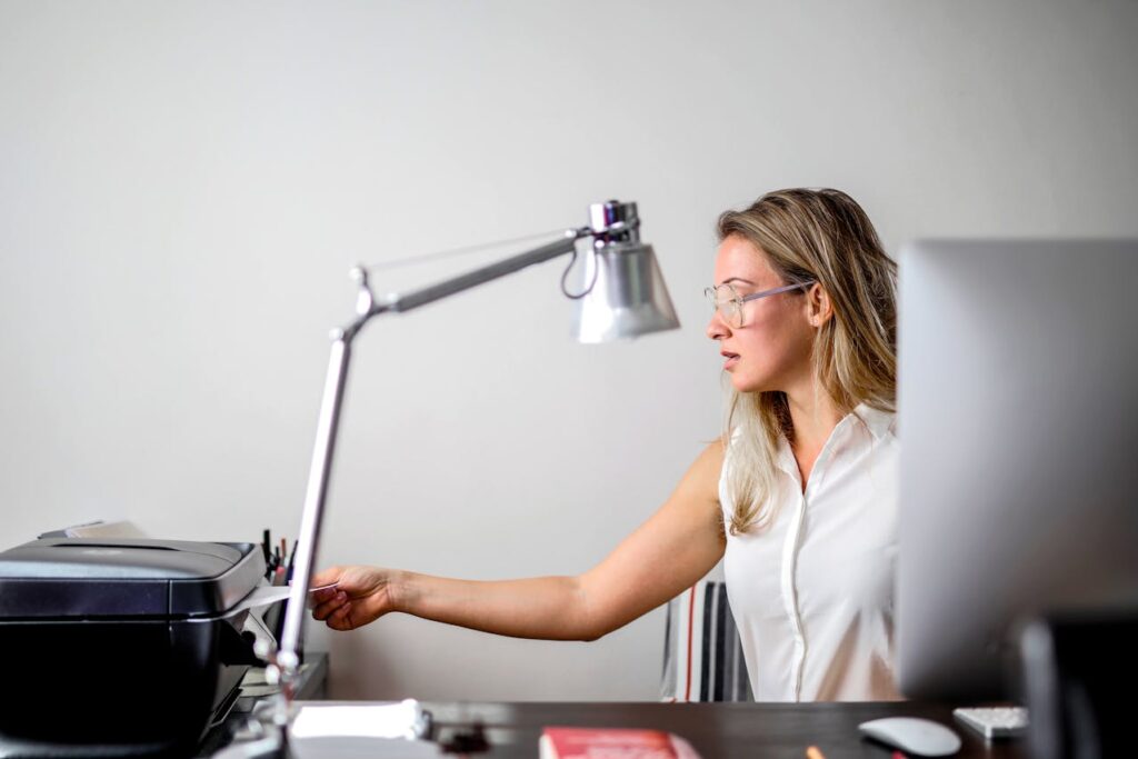 Woman working at home on her computer