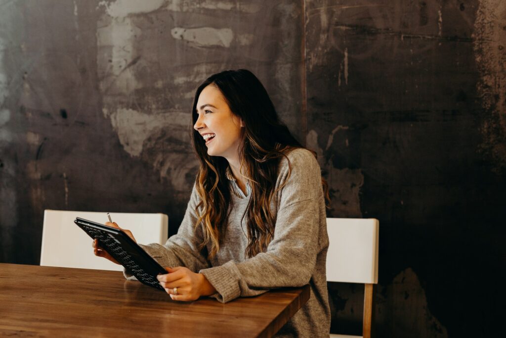 Woman starting her career after getting hired using AI-assisted job search strategies