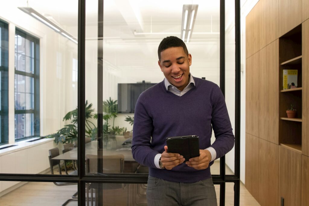 Young Job Seeker looking for work on a tablet